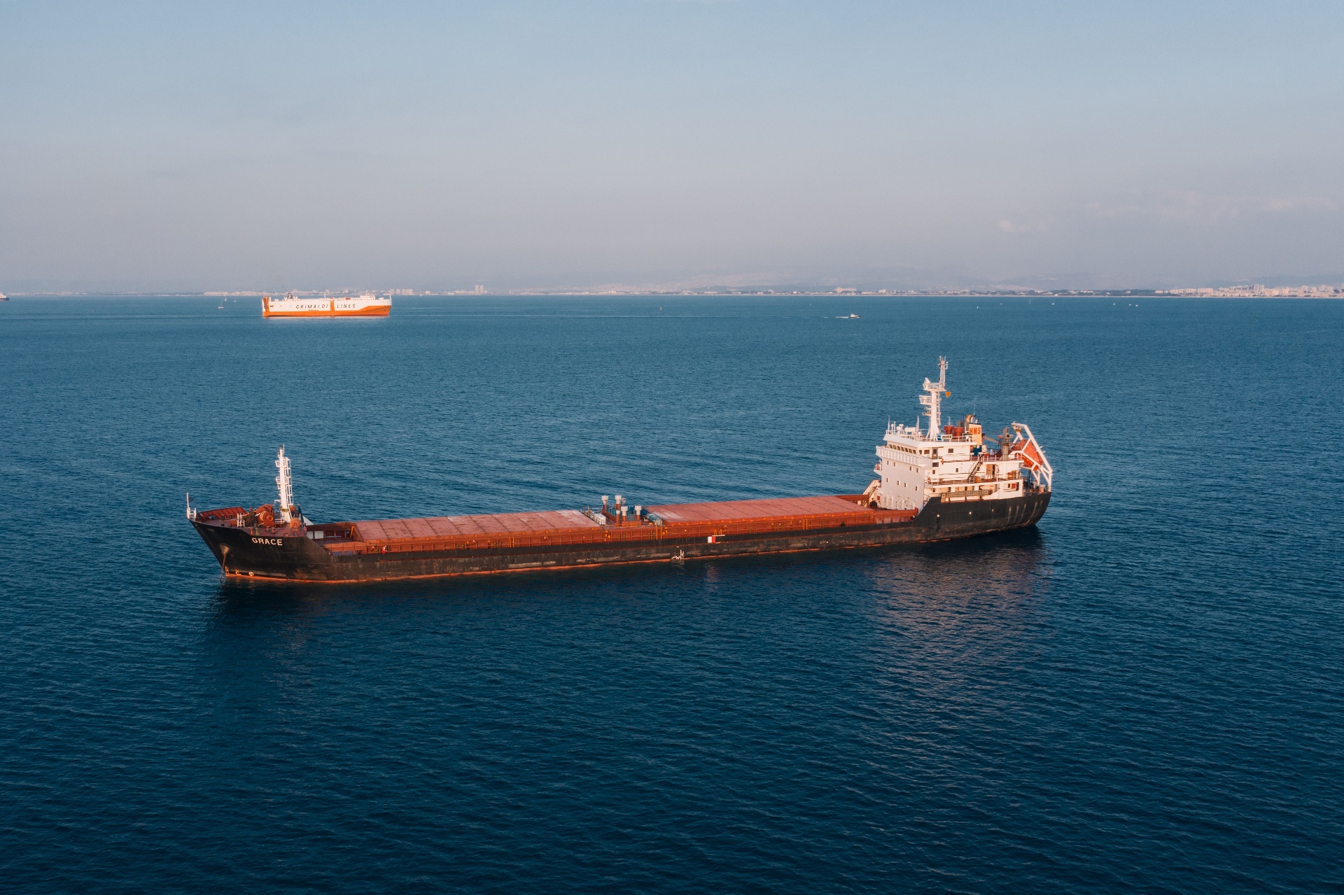 Cargo vessel anchored offshore in West Africa